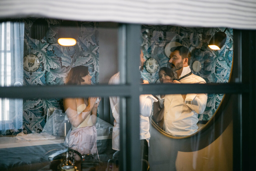 Bride and Groom getting ready together at the Eliza Jane Hotel in New Orleans