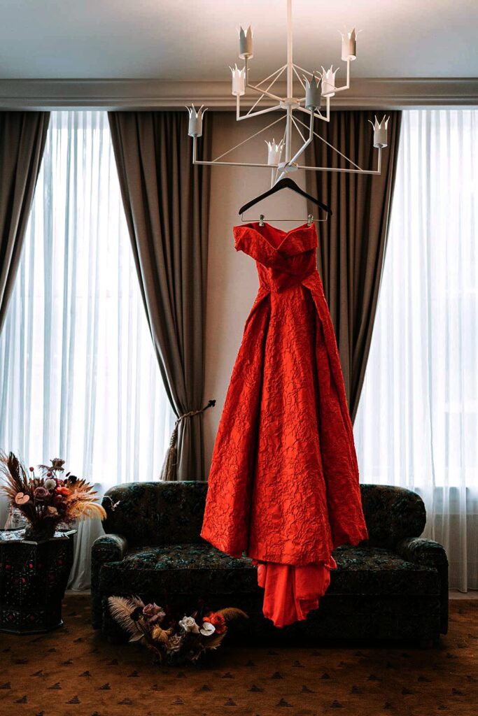 Red dress hanging in a suite at the Maison de la Luz hotel in New Orleans