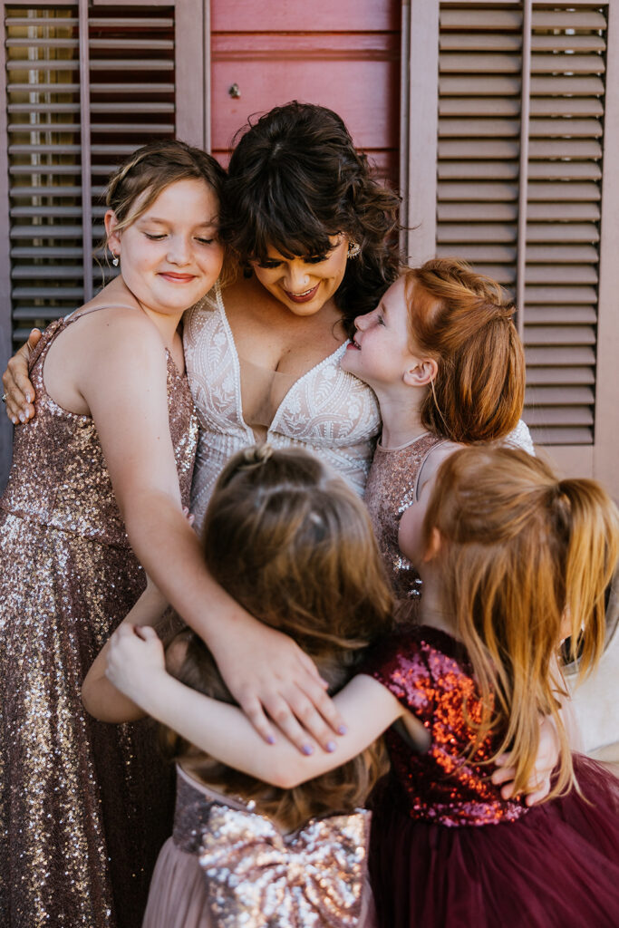 Bride with flower girls at the Macarty house in New Orleans Bywater