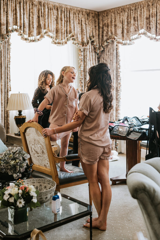 Bridesmaids getting ready on wedding day together at the Hotel Monteleone in New Orleans