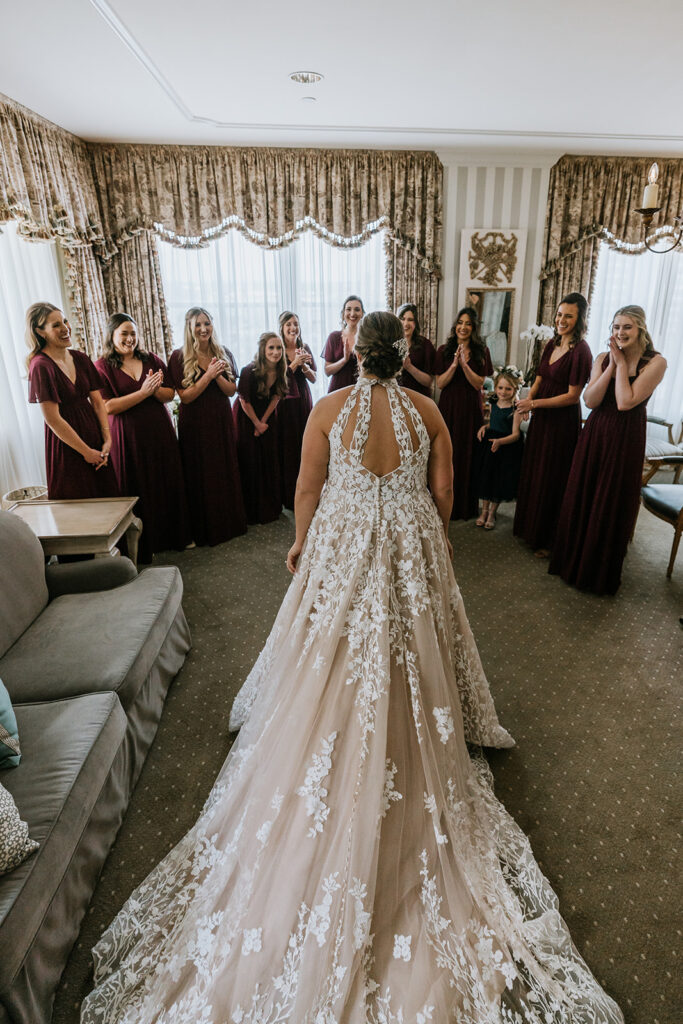 Bride first look with Bridesmaids on wedding day together at the Hotel Monteleone in New Orleans