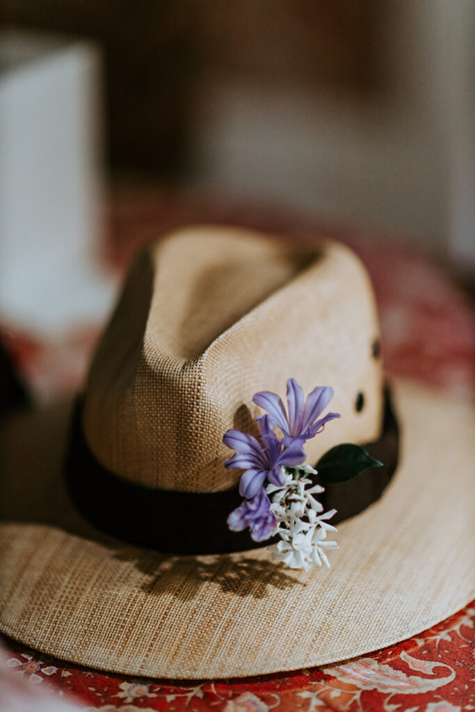 Grooms hat with florals at Airbnb in the Marigny Neighborhood of New Orleans