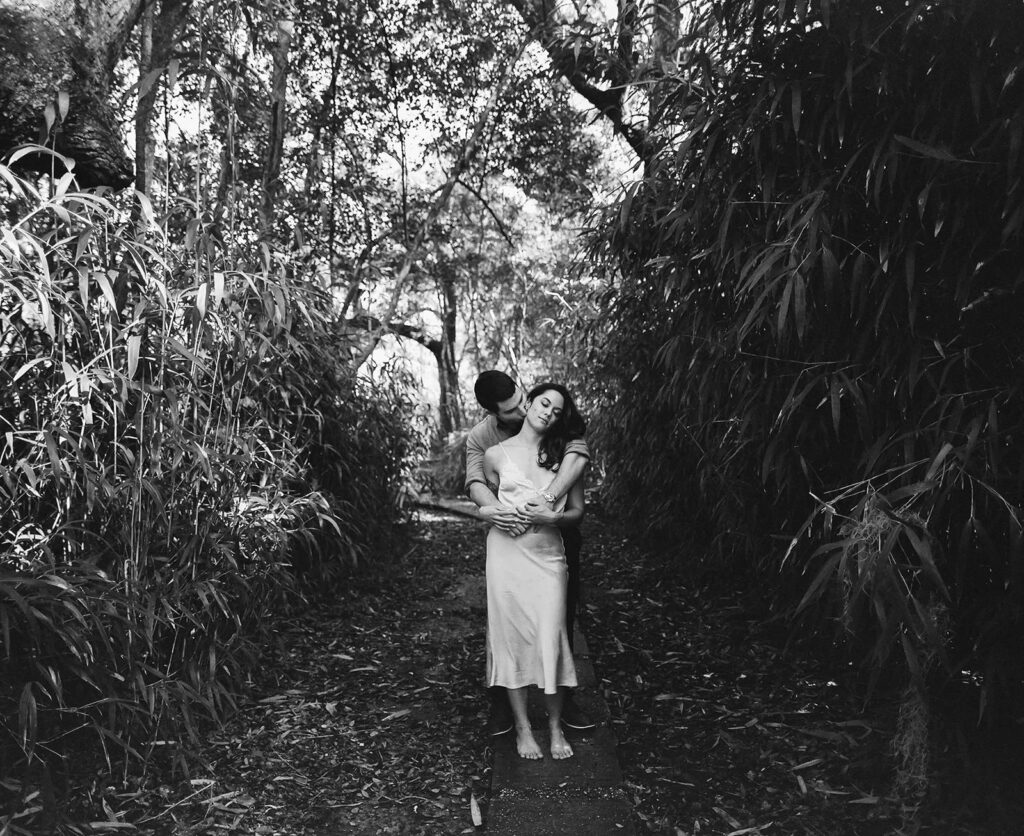 Couple photographed at Avery Island with traditional film photography in black and white.