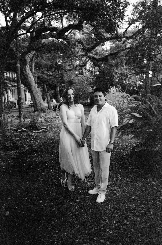 Couple photographed with film photography in black and white.