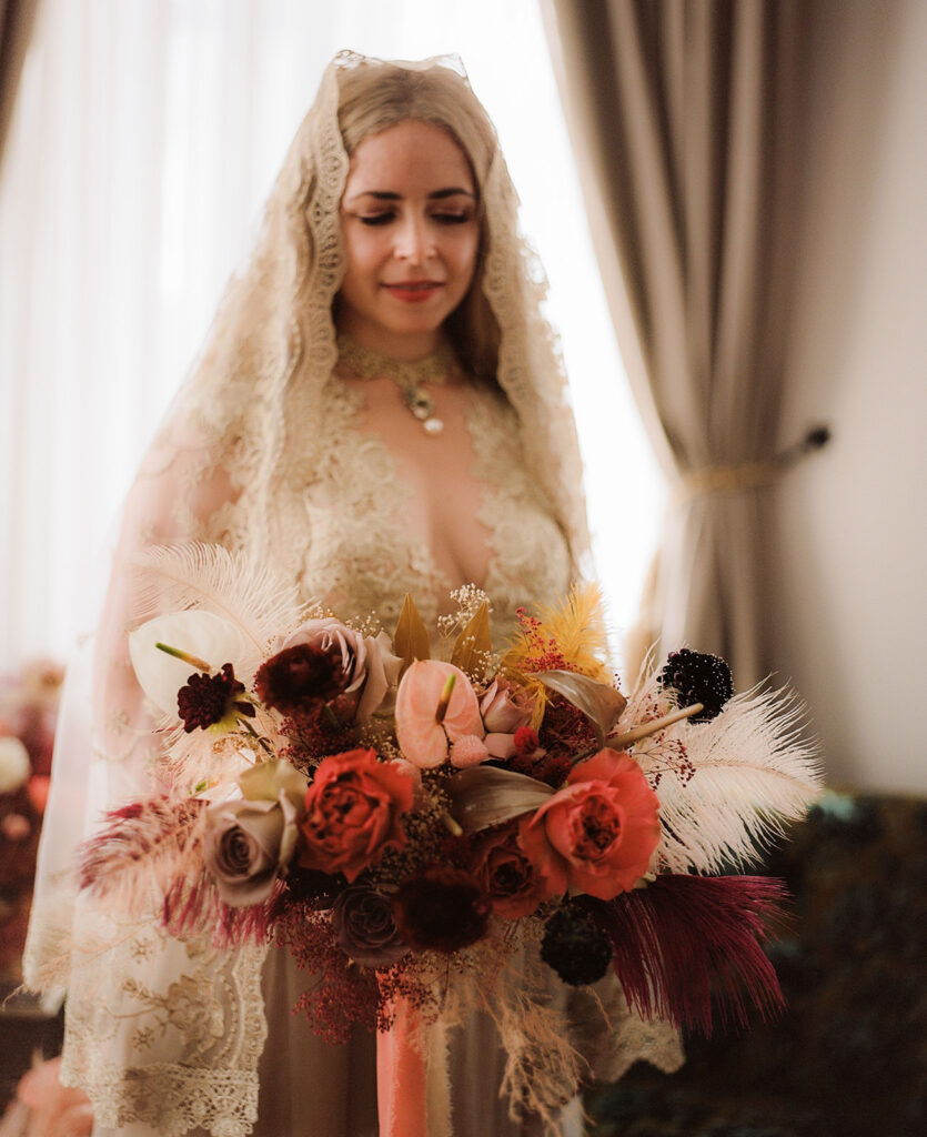 Bride with beautiful bouquet by Flower Disco photographed with traditional film wedding photography in Le Maison de la Luz in New Orleans.