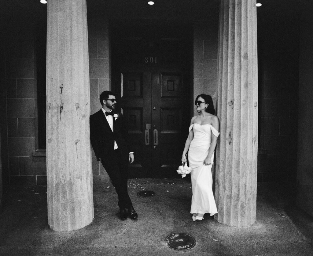 Bride and Groom photographed on their wedding day with black and white film photography.