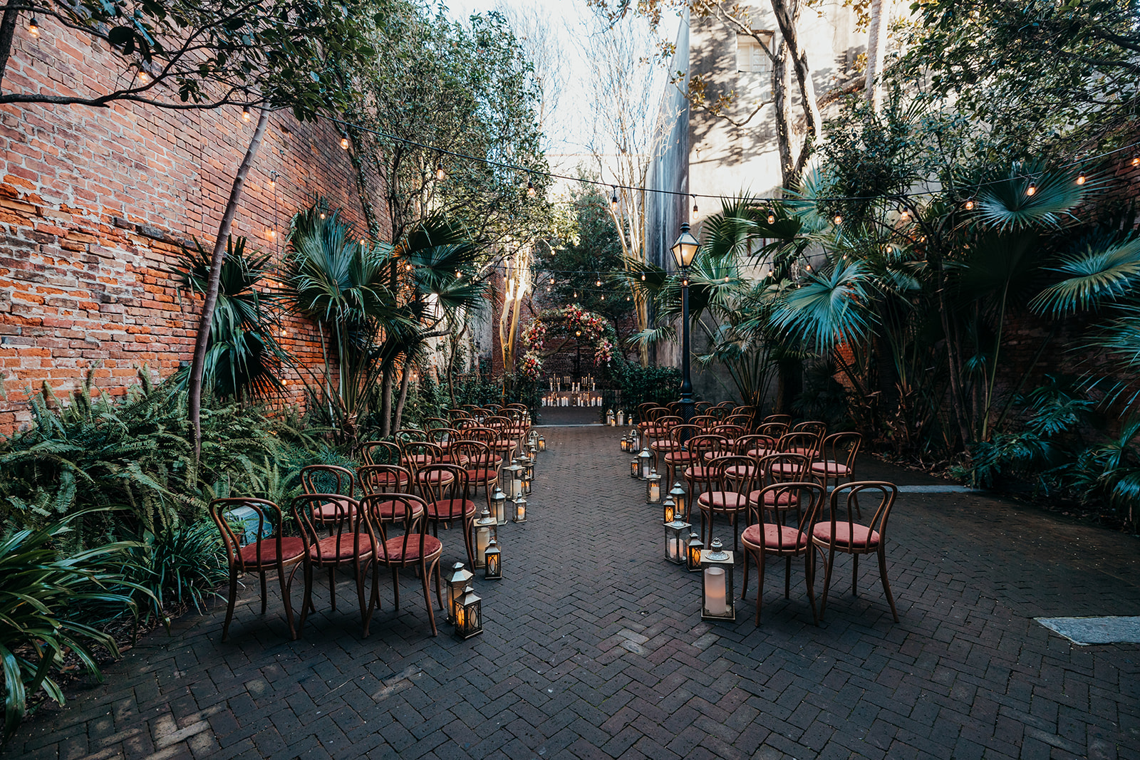 Decoration and florals for a wedding in the courtyard of the New Orleans Pharmacy Museum