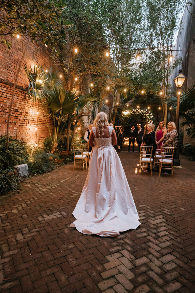 Bride at Wedding in The New Orleans Pharmacy Museum courtyard